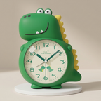 Green dinosaur-shaped clock on a beige background