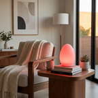 Living room with a wooden chair, side table, and lamp emitting a warm glow.