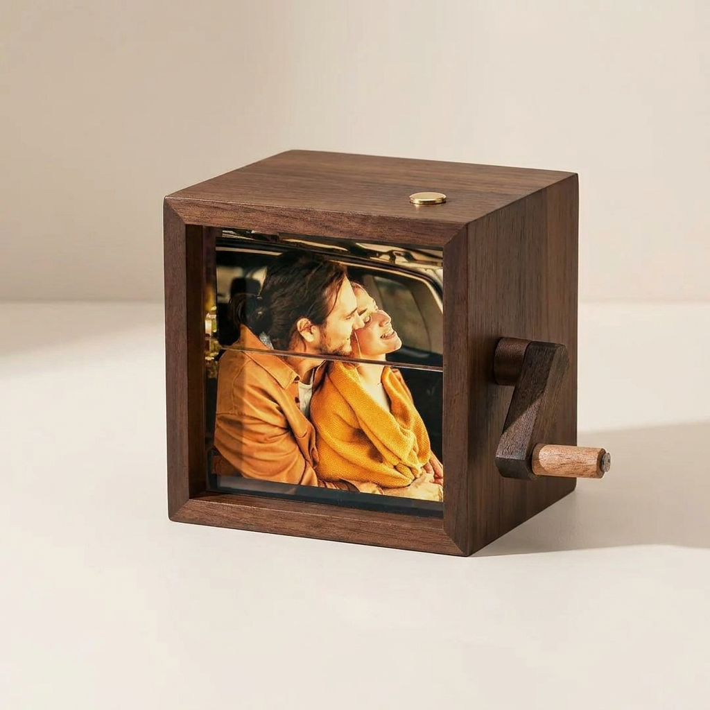 Wooden photo box with a couple inside on a white surface