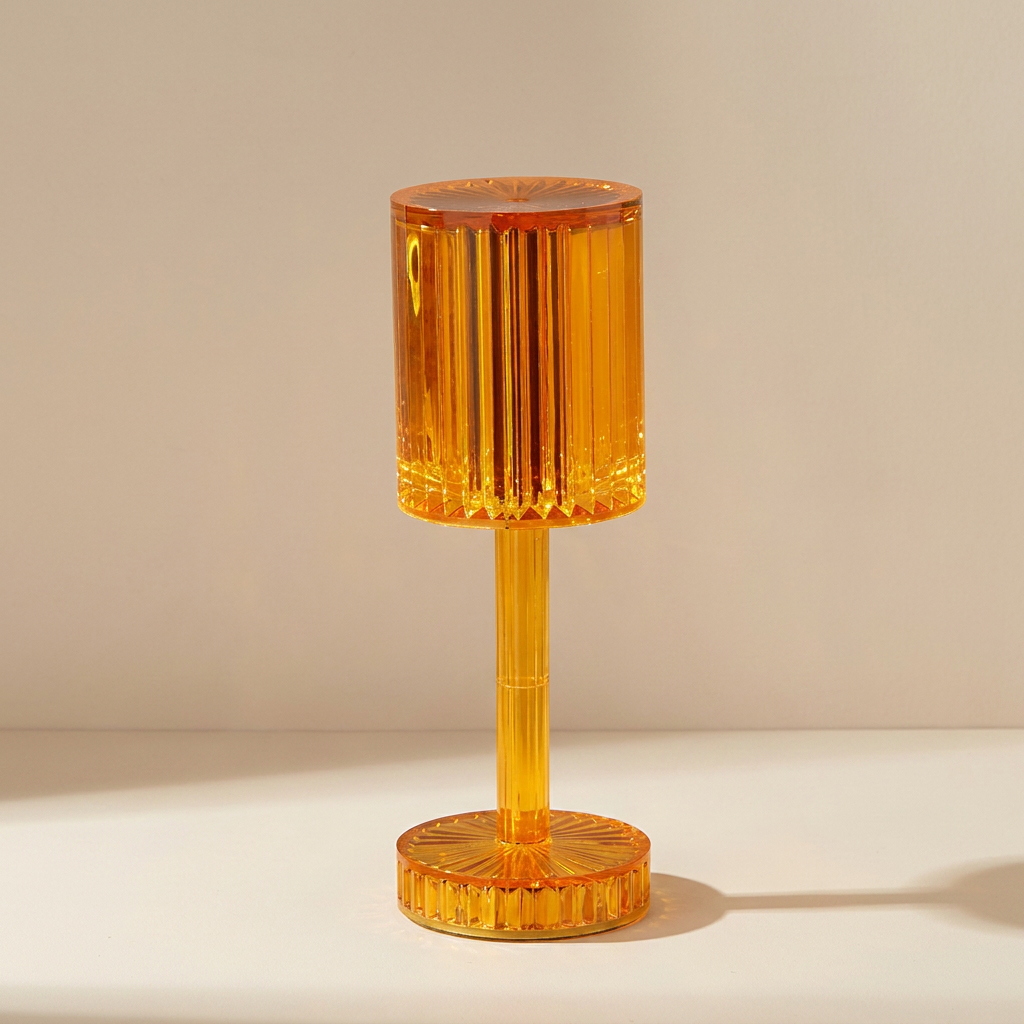 Orange table lamp with ribbed design on a beige background