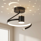 Modern black ceiling light fixture with star and moon designs on the ceiling