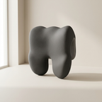 Modern gray elephant-shaped object on a neutral background