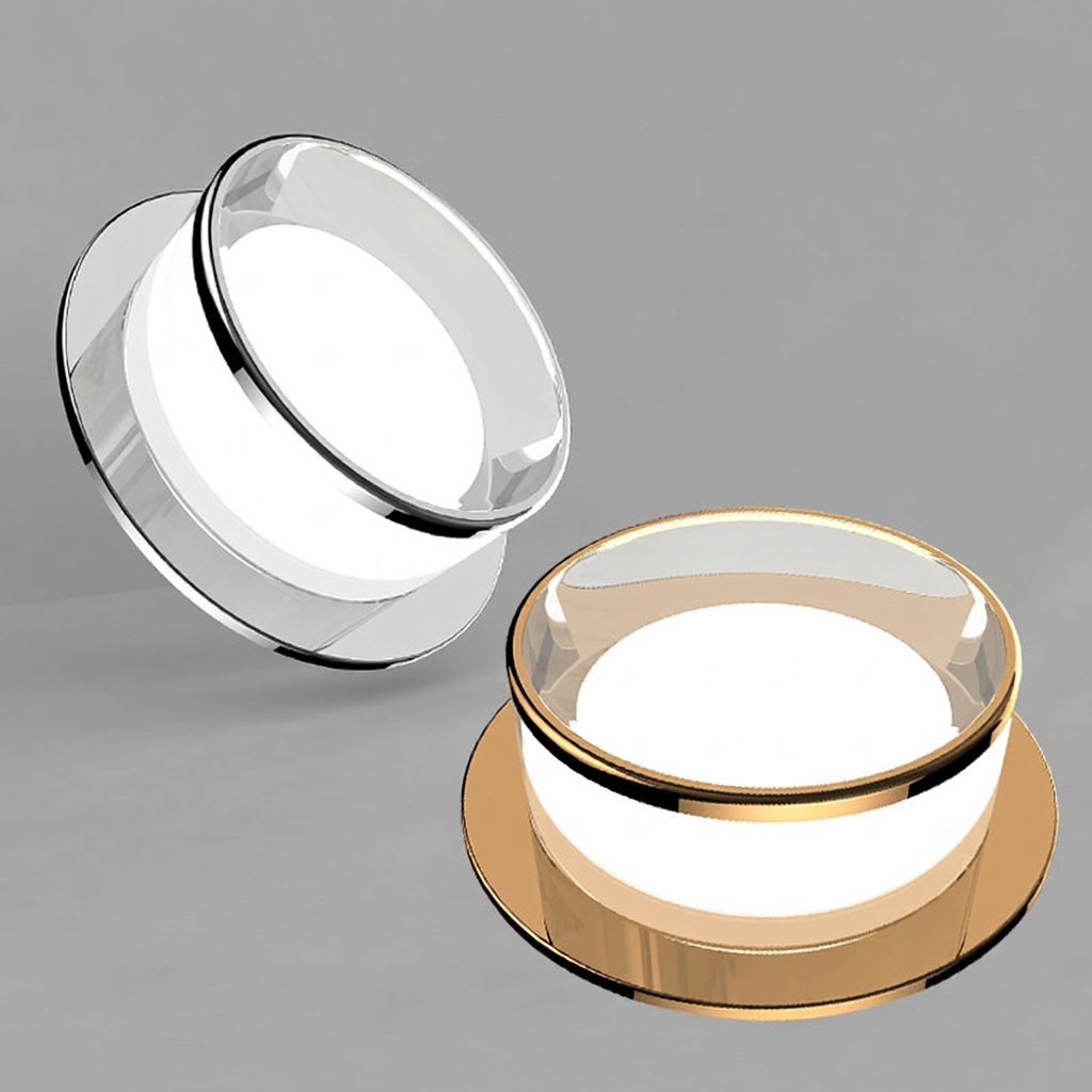 Two glass containers with gold bases on a gray background