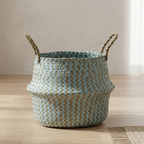 Woven basket with zigzag pattern on a wooden floor