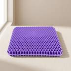 Purple honeycomb cushion on a beige floor