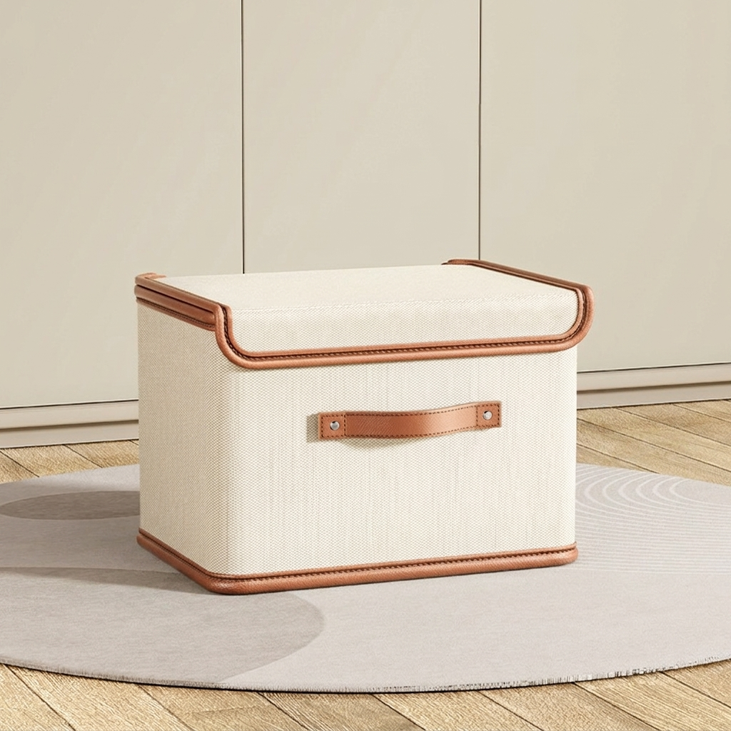 Beige storage box with brown trim on a wooden floor