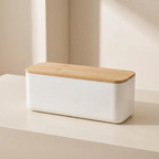 White bread box with a wooden lid on a beige surface