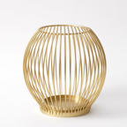 Gold wire basket on a white background