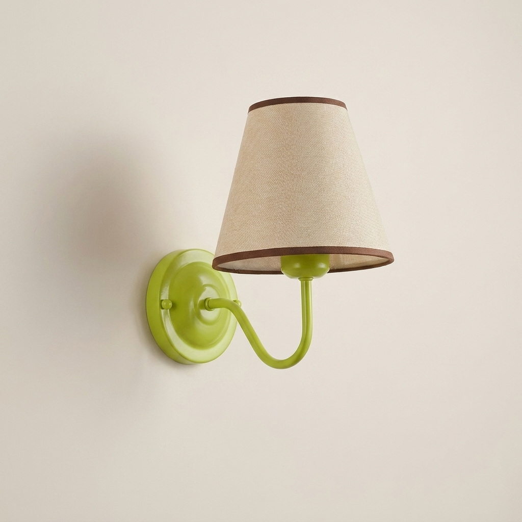 A wall-mounted sconce with a bright lime green metal wall plate and curved arm, paired with a tapered beige fabric shade trimmed in dark brown.