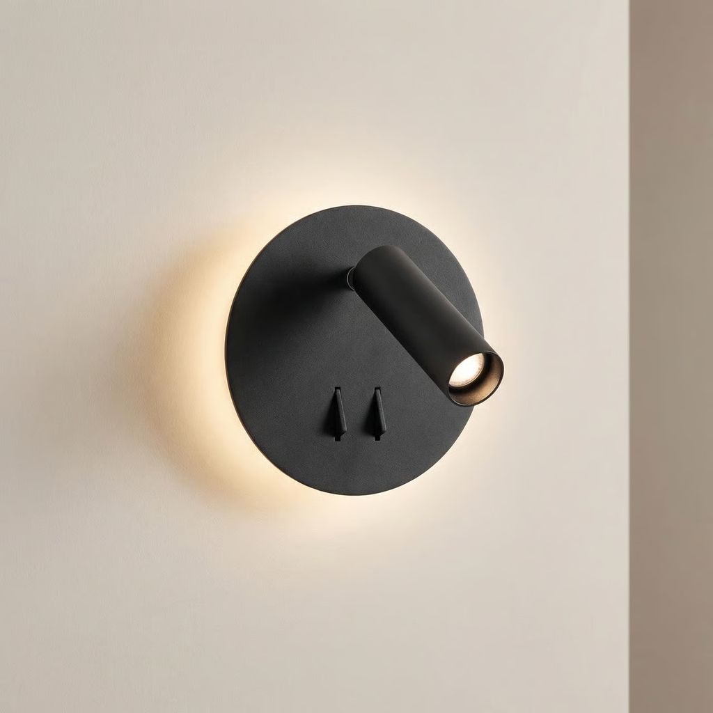 Modern black wall light fixture on a neutral wall