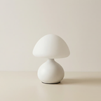 White mushroom-shaped table lamp on a beige background
