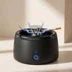 Black electronic device with a blue power indicator light on a beige background