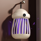 White electronic insect killer with purple light on a dark background