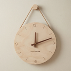Wooden wall clock with 'Enjoy Your Time' text on a beige background