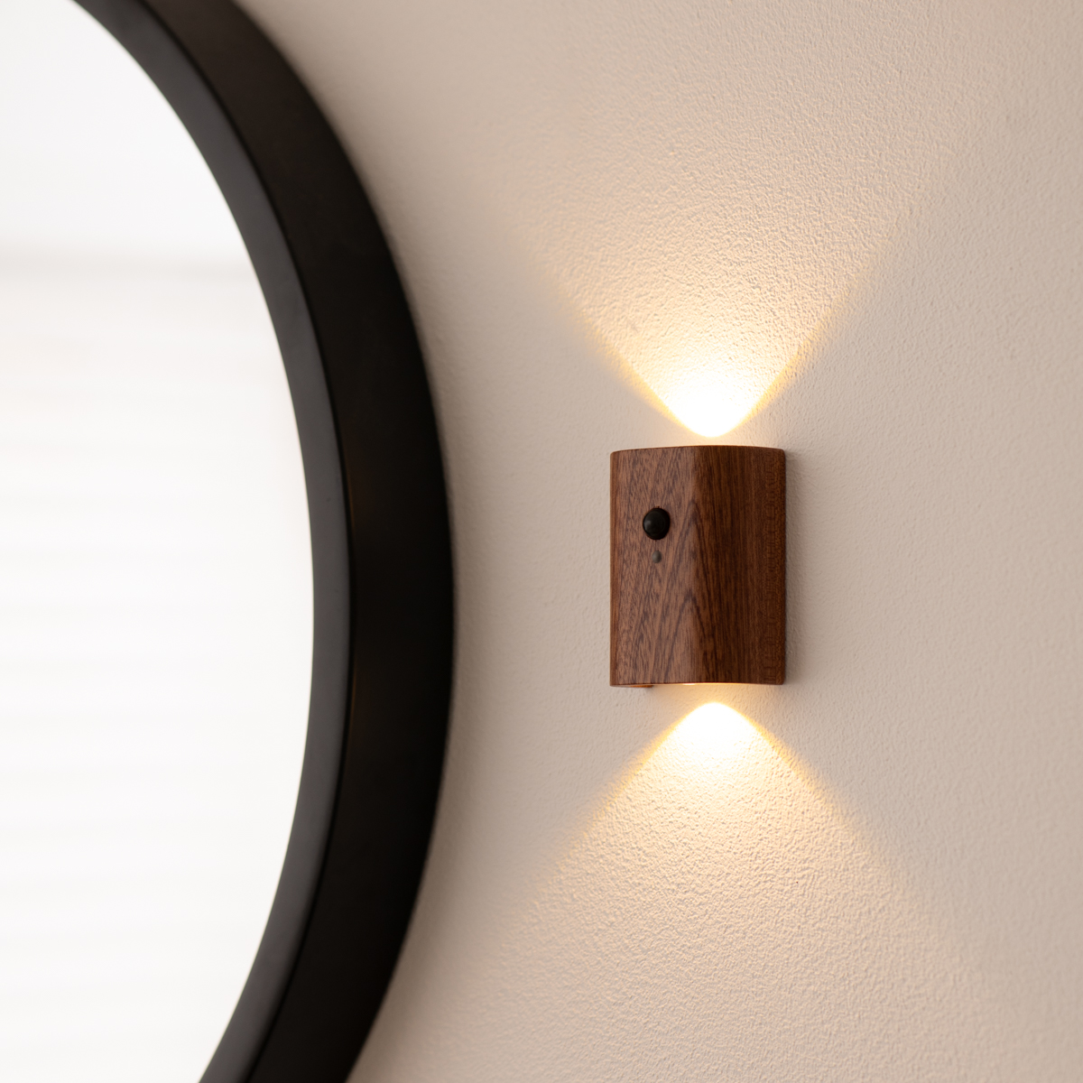 Wooden wall light fixture on a neutral wall