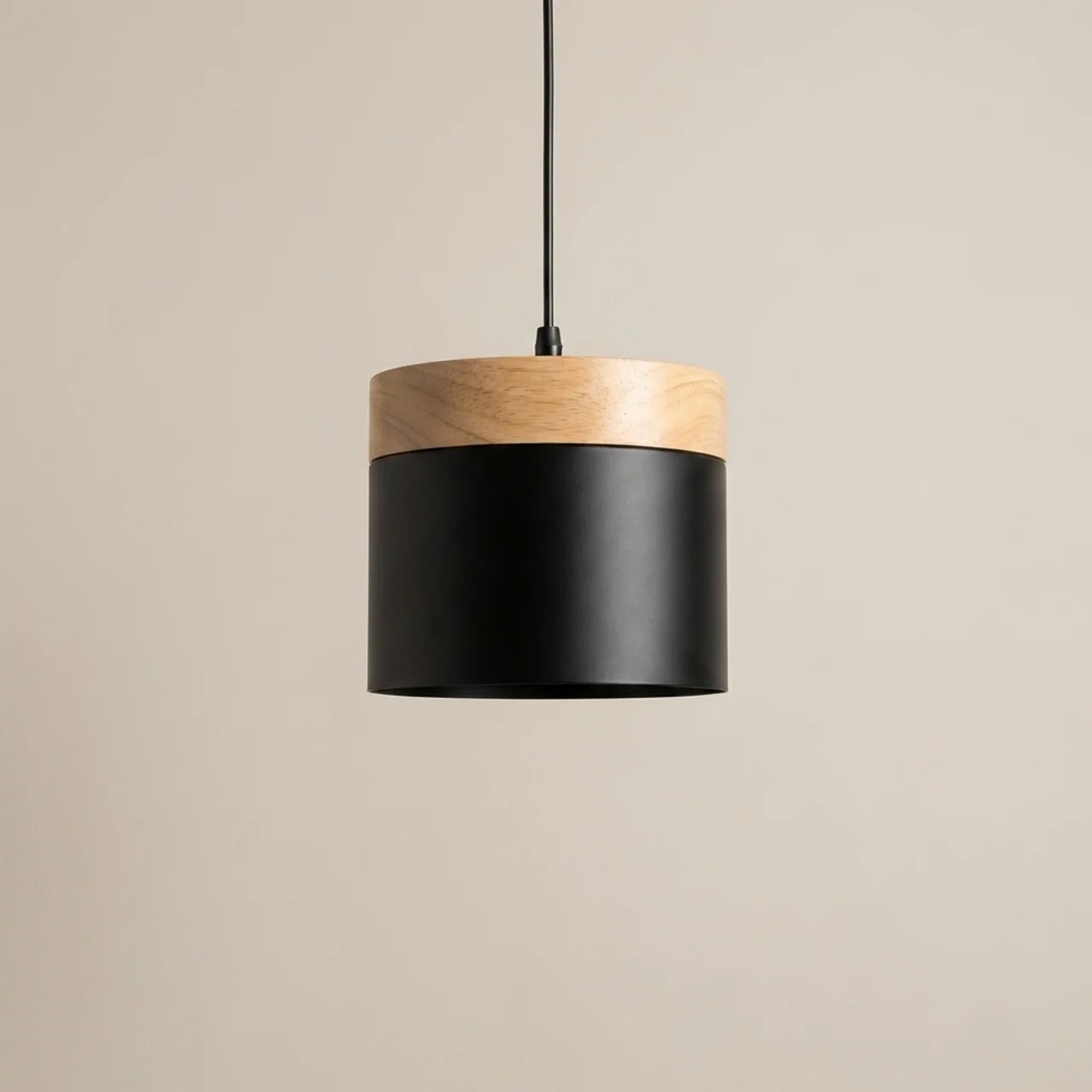 Pendant light with black and wooden design on a beige background