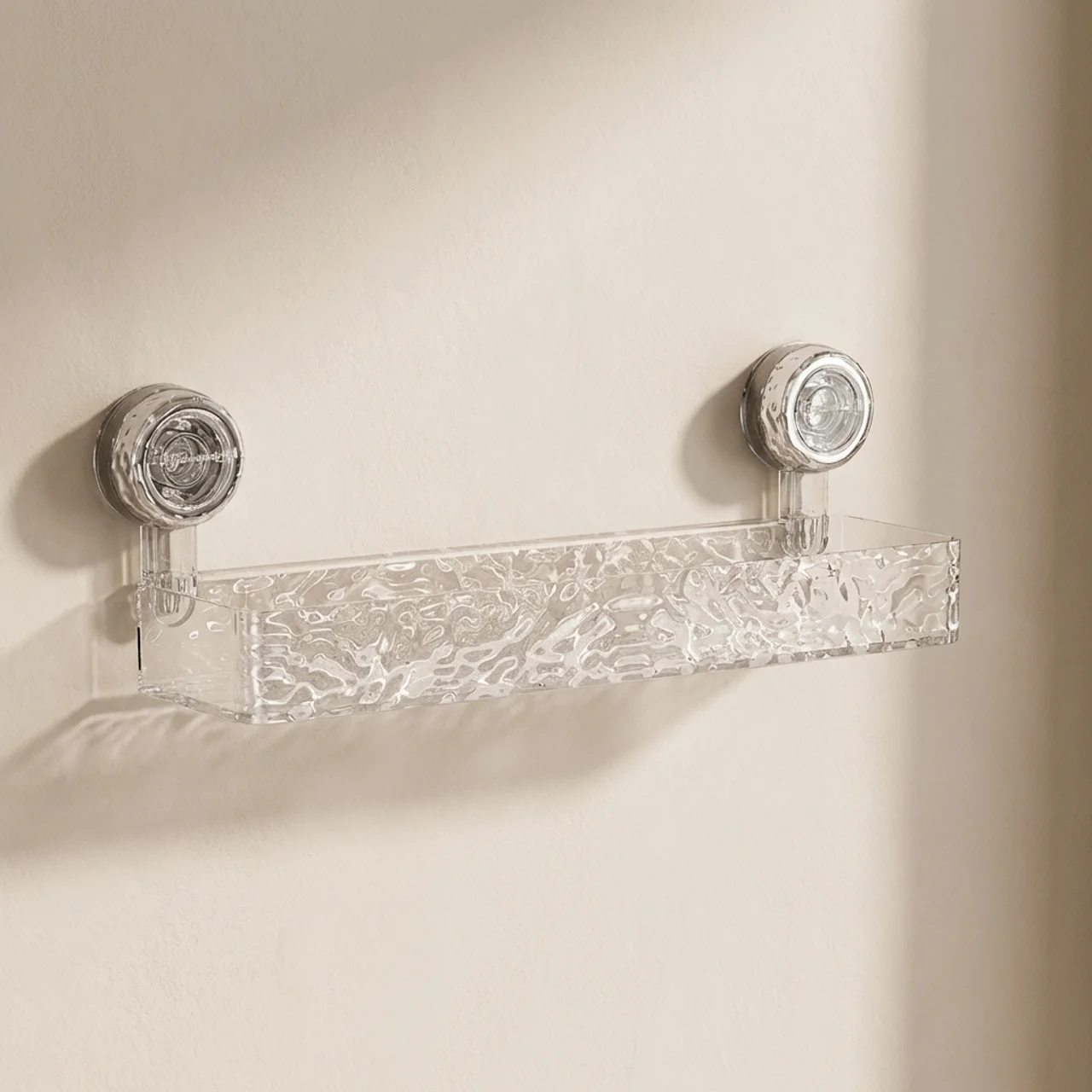 Clear glass shelf with decorative knobs on a beige wall