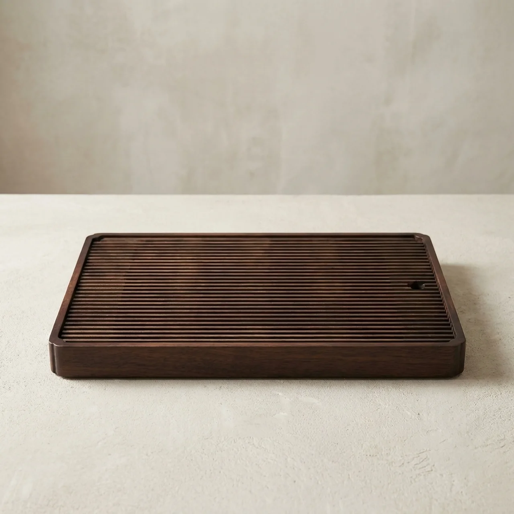 Wooden tray with textured surface on a light background