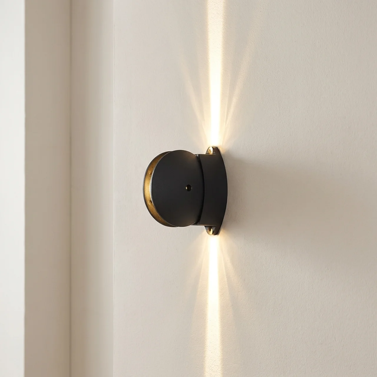 Modern wall-mounted light fixture on a neutral wall
