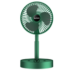 Green portable fan on a white background