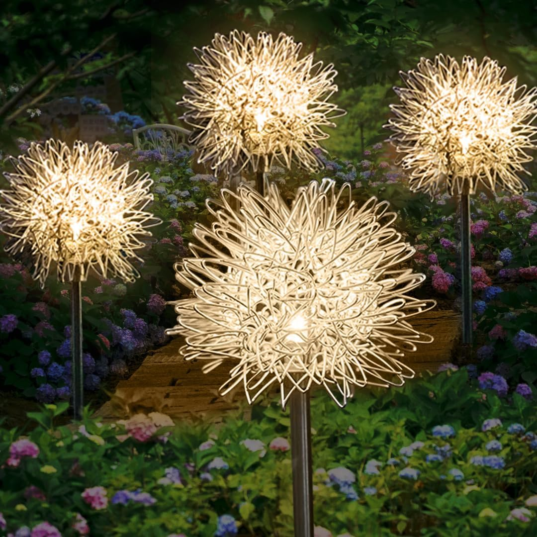 Decorative outdoor lights shaped like flowers in a garden setting