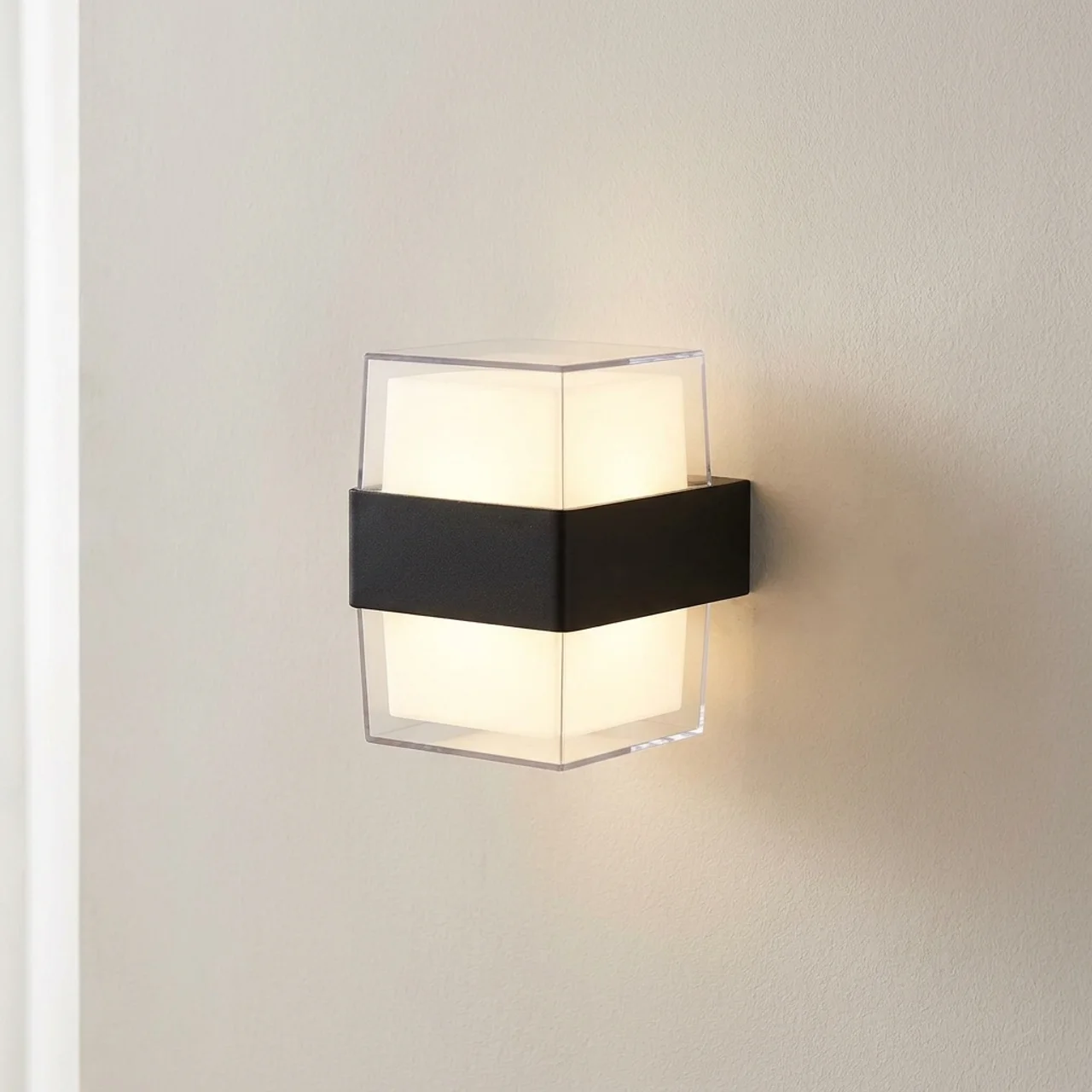 Modern wall light fixture on a neutral wall