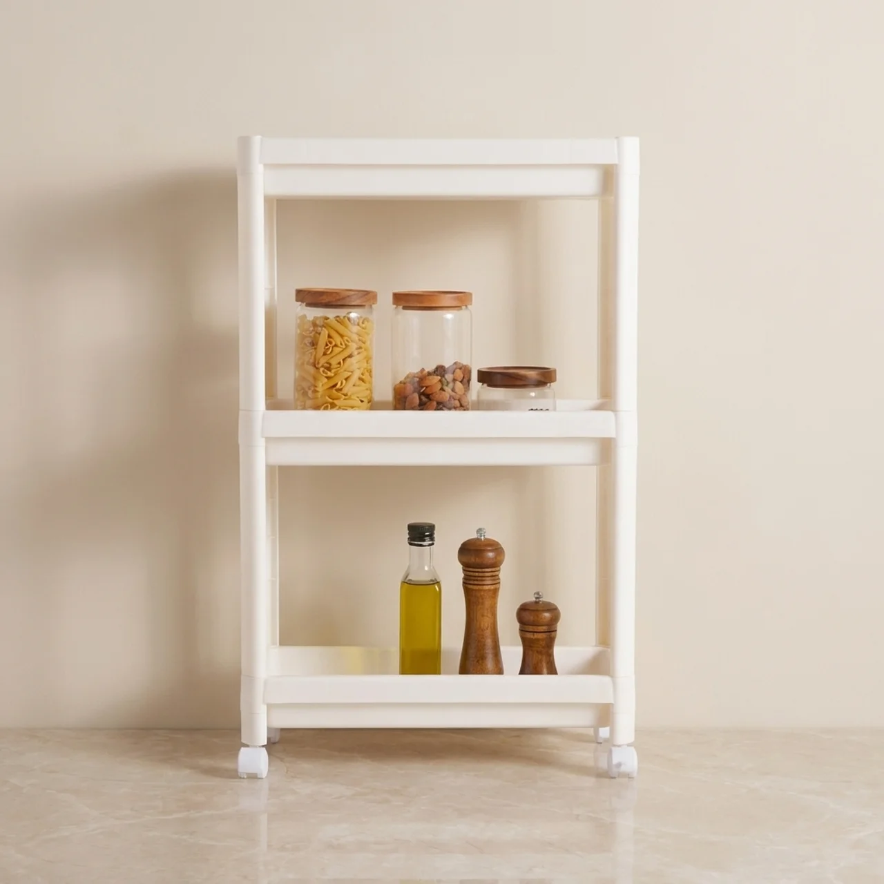 White kitchen shelf with jars and bottles against a beige wall