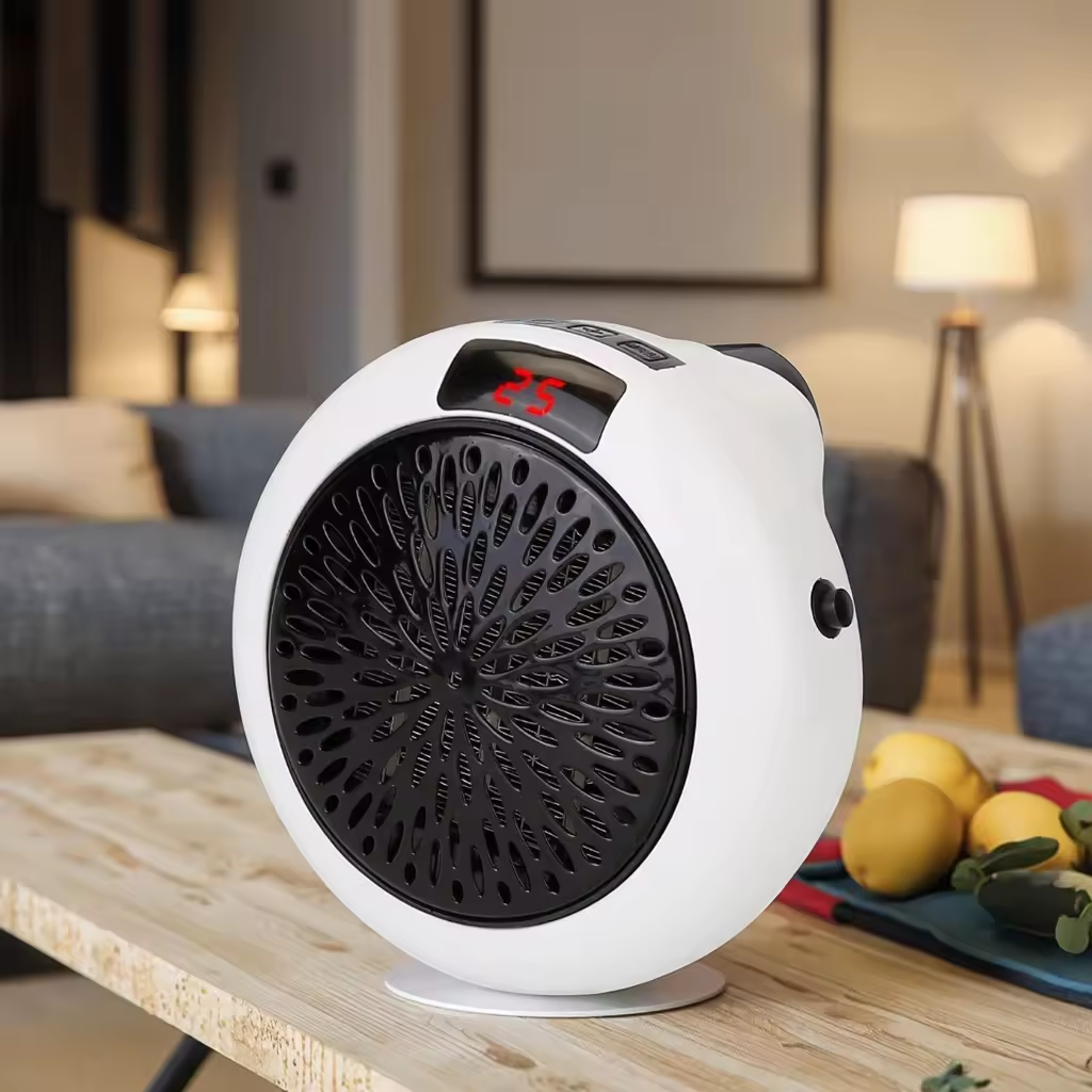 White and black space heater on a wooden table with a blurred living room background