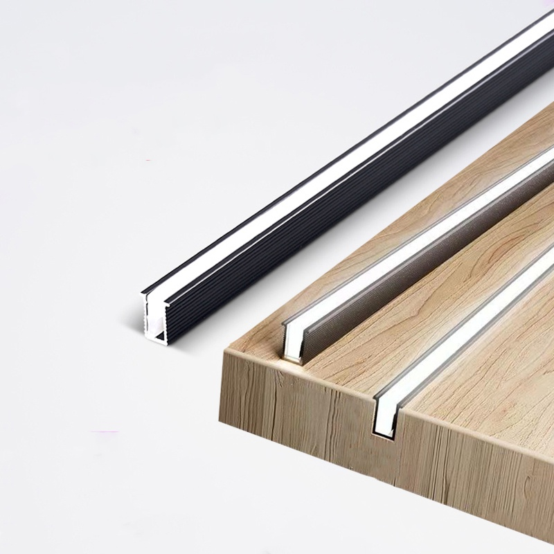 Close-up of a wooden surface with metal tracks on a white background