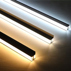 Two LED strip lights emitting different colors of light on a dark background.