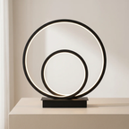 Modern table lamp with circular design on a neutral background