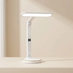 White LED desk lamp with digital display on a beige surface.