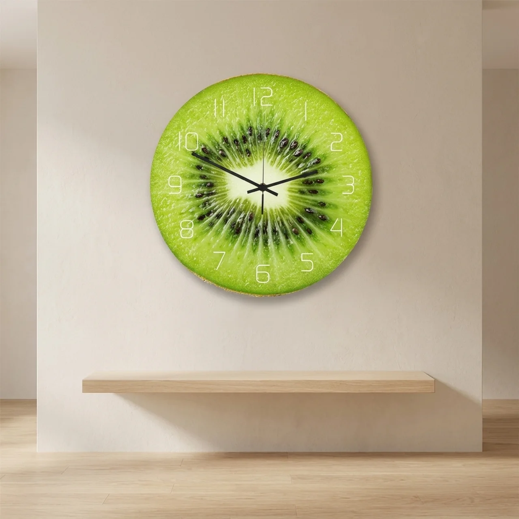 Wall clock designed like a kiwi fruit on a plain wall.