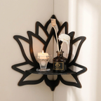 Decorative wall shelf with candle and bottle on a light background