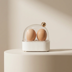 Two eggs in a glass dome on a beige background