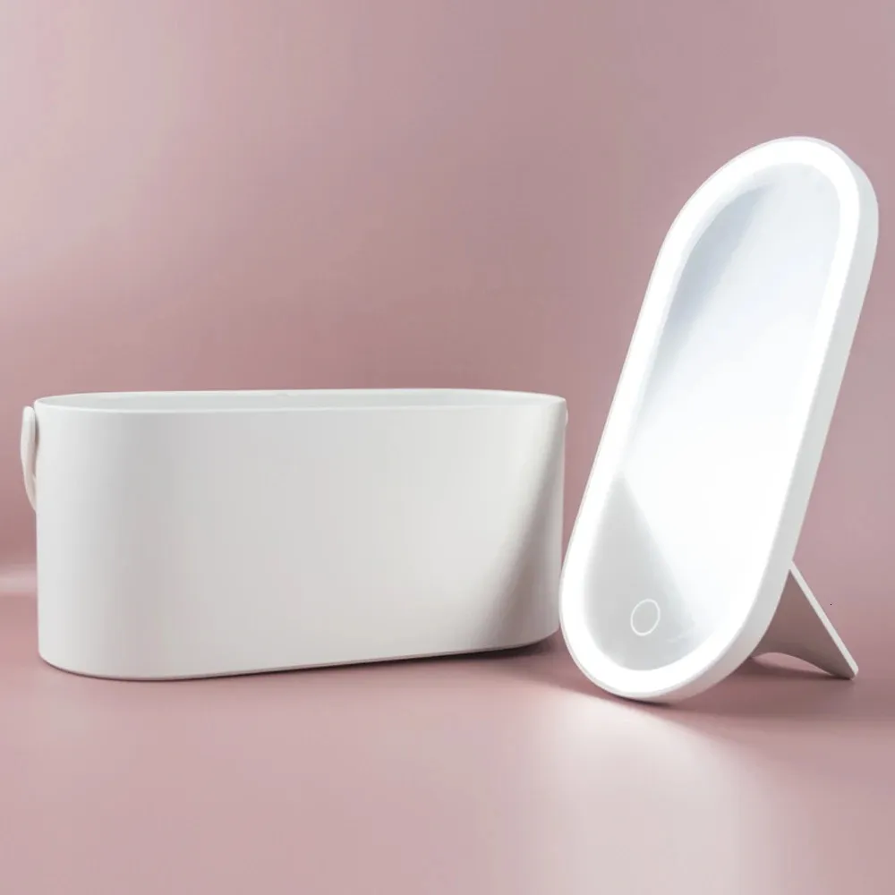 White electronic device with a cover on a pink background