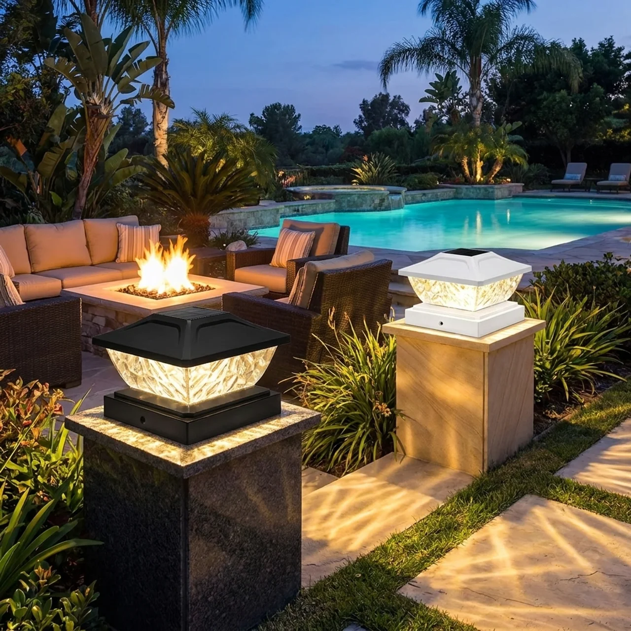 Outdoor patio with fire pit, lounge chairs, and pool at dusk.
