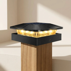 Solar-powered post light on a wooden post with a neutral background