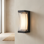 Modern outdoor wall light fixture on a neutral wall.