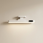 A modern white wall-mounted LED light bar with a black control panel on the right side, shown illuminated against a warm beige wall.