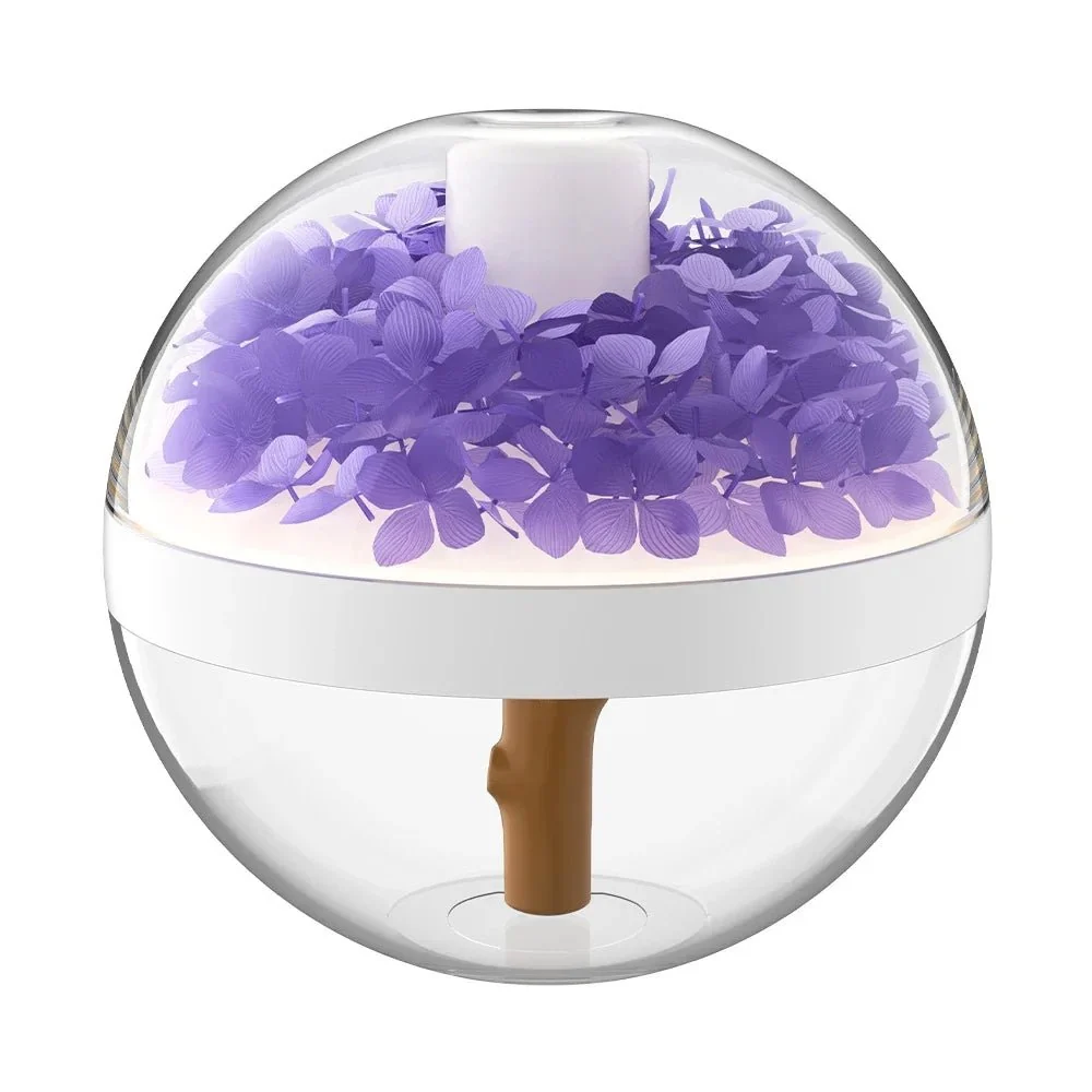 Clear spherical container with purple flowers and a wooden stick on a white background