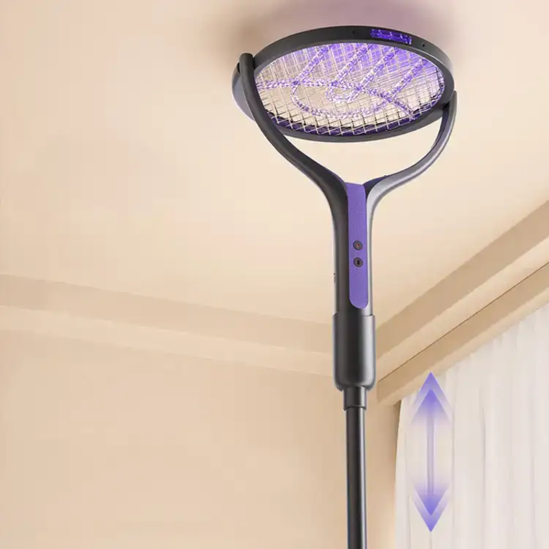 A black and purple electric mosquito trap with a paddle-style head, mounted on a beige ceiling in a room. A purple arrow graphic on the right indicates downward motion.