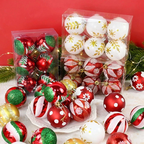 A collection of Christmas ball ornaments in red, green, and white, with some ornaments packaged in clear plastic bags and others displayed on a white plate against a red background.