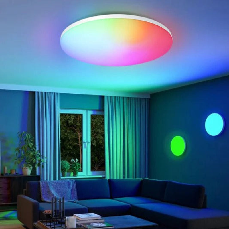 Living room with a colorful ceiling light fixture and RGB wall lights.