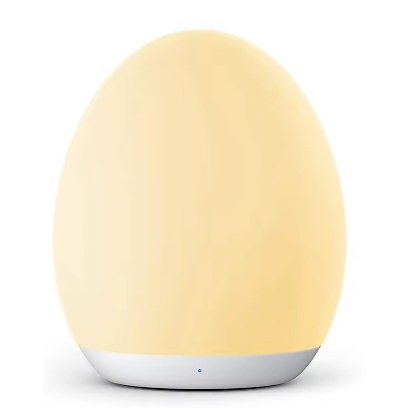 Yellow smart speaker with a white base on a white background