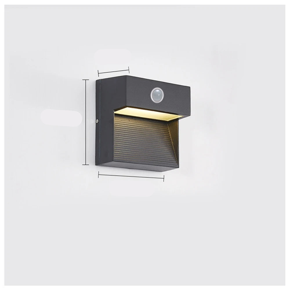 Wall-mounted outdoor light fixture with dimensions on a white background