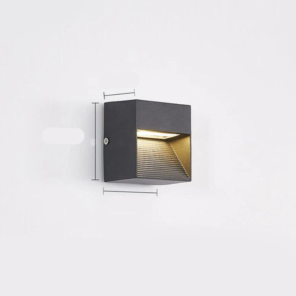 Wall-mounted outdoor light fixture with dimensions labeled on a white background