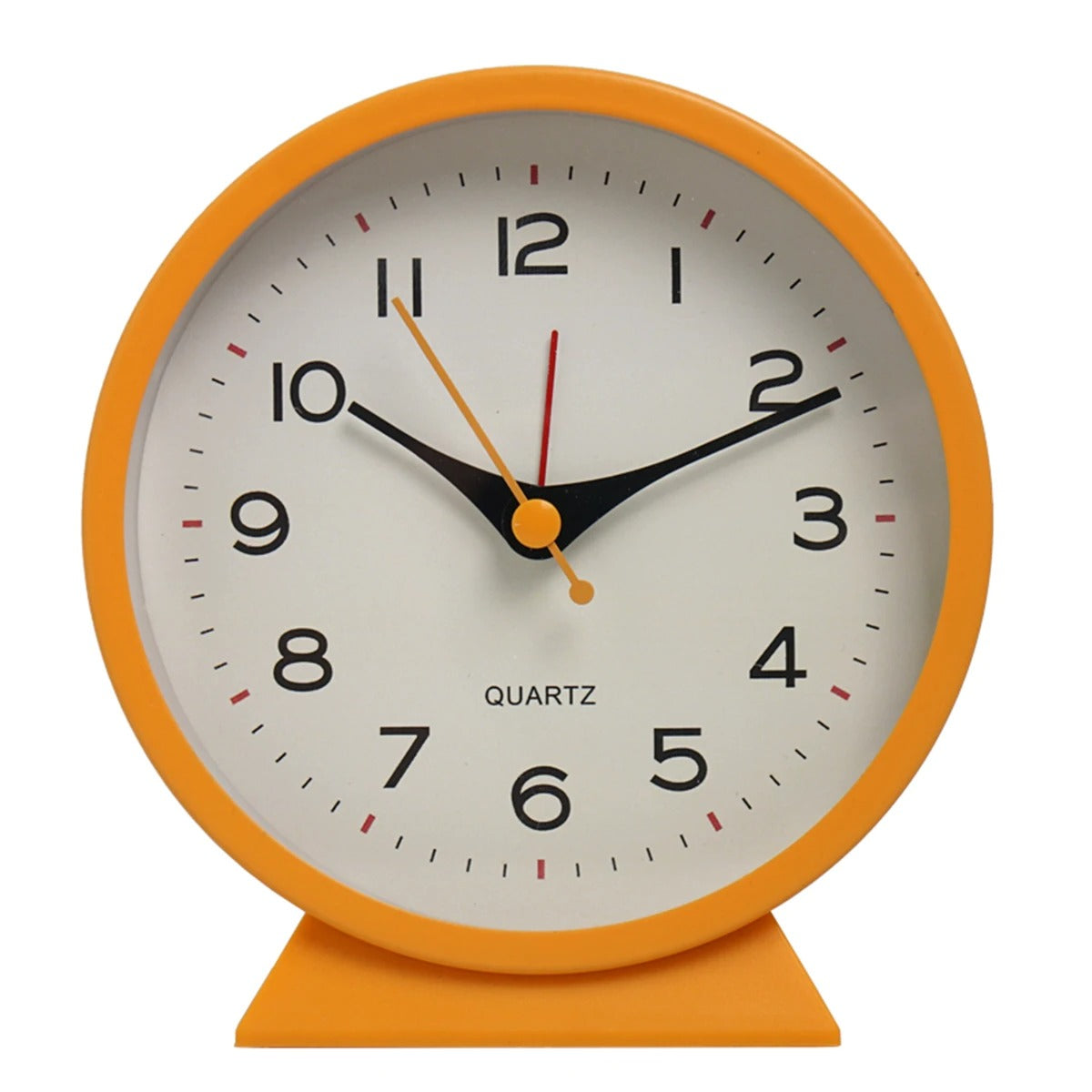 Orange clock with a white face on a white background
