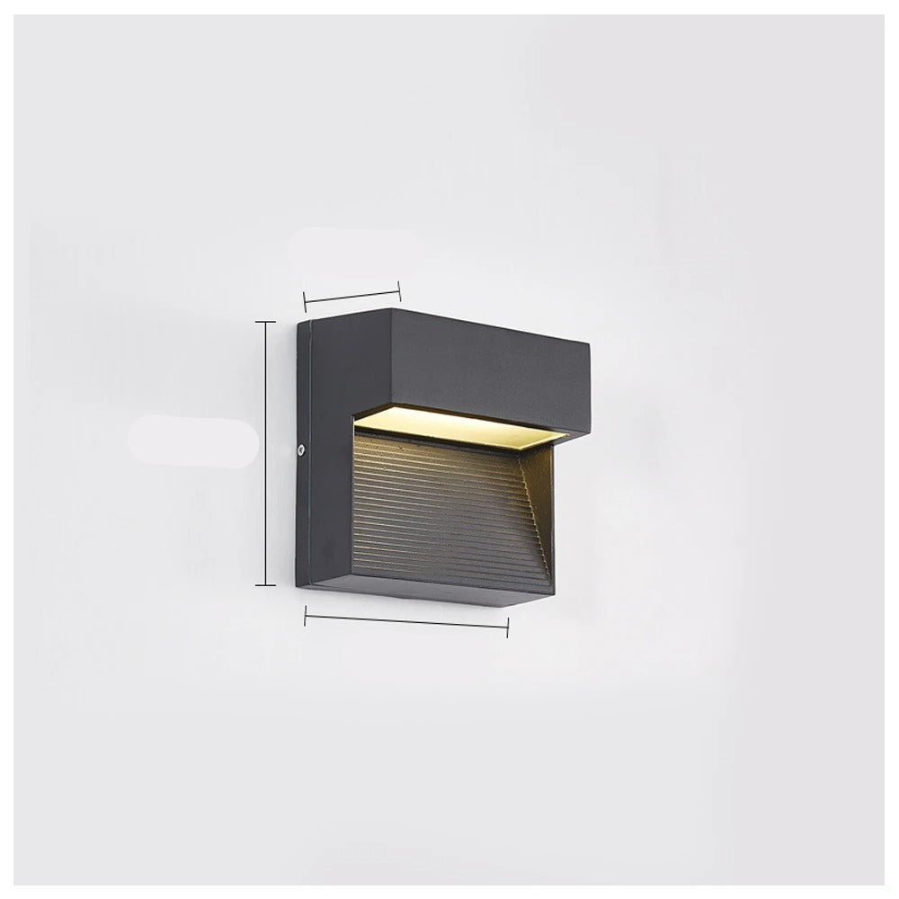Wall-mounted outdoor light fixture with dimensions labeled on a white background