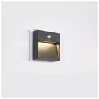 Wall-mounted outdoor light fixture with dimensions on a white background